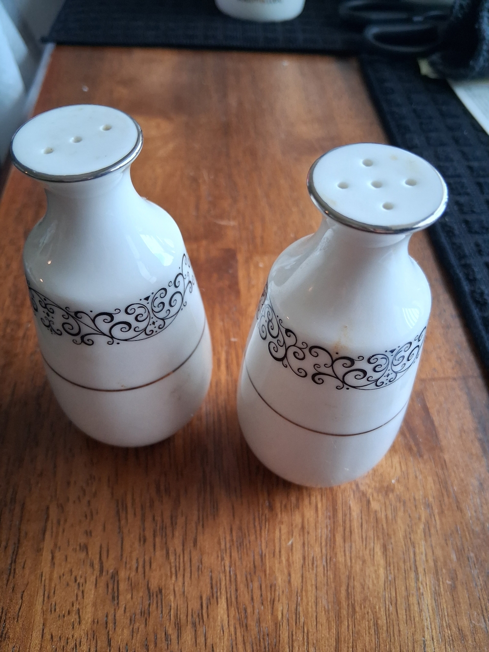 Elegant White Ceramic Salt and Pepper Shaker Set with Silver Trim